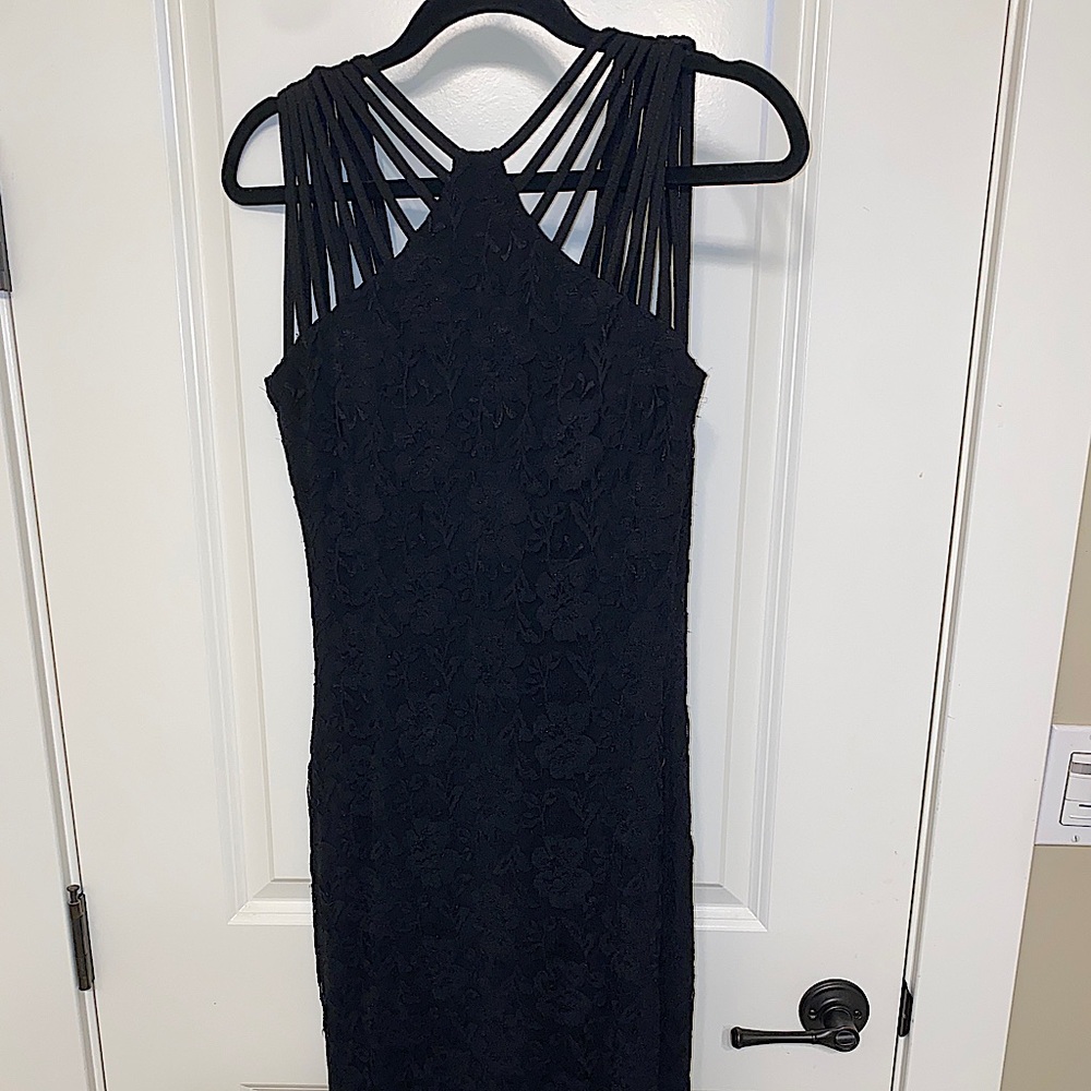 Bodycon elegant black dress with floral etching. Very great condition.